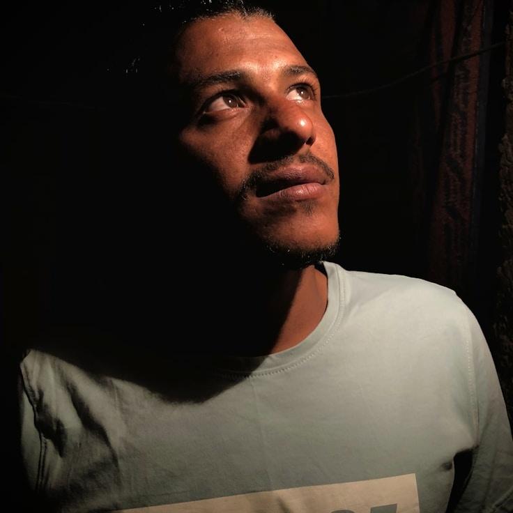 Kaveri Mehta, Lead Design Curator at Whisper Maple Bench, reviewing corporate floral arrangements